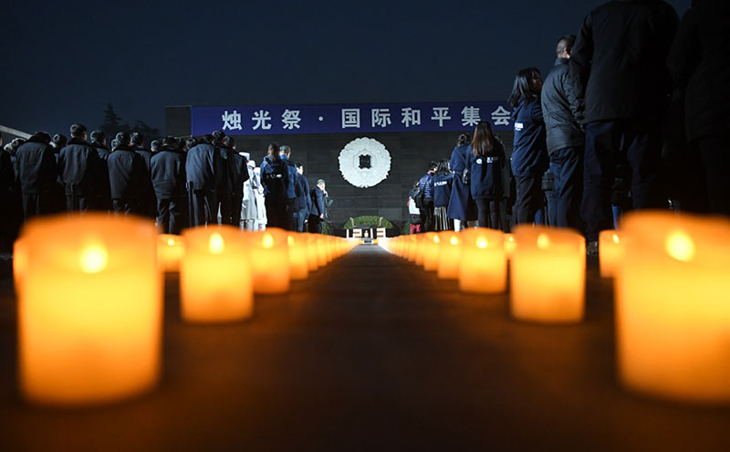 南京举行烛光祭和平集会 悼念大屠杀死难者